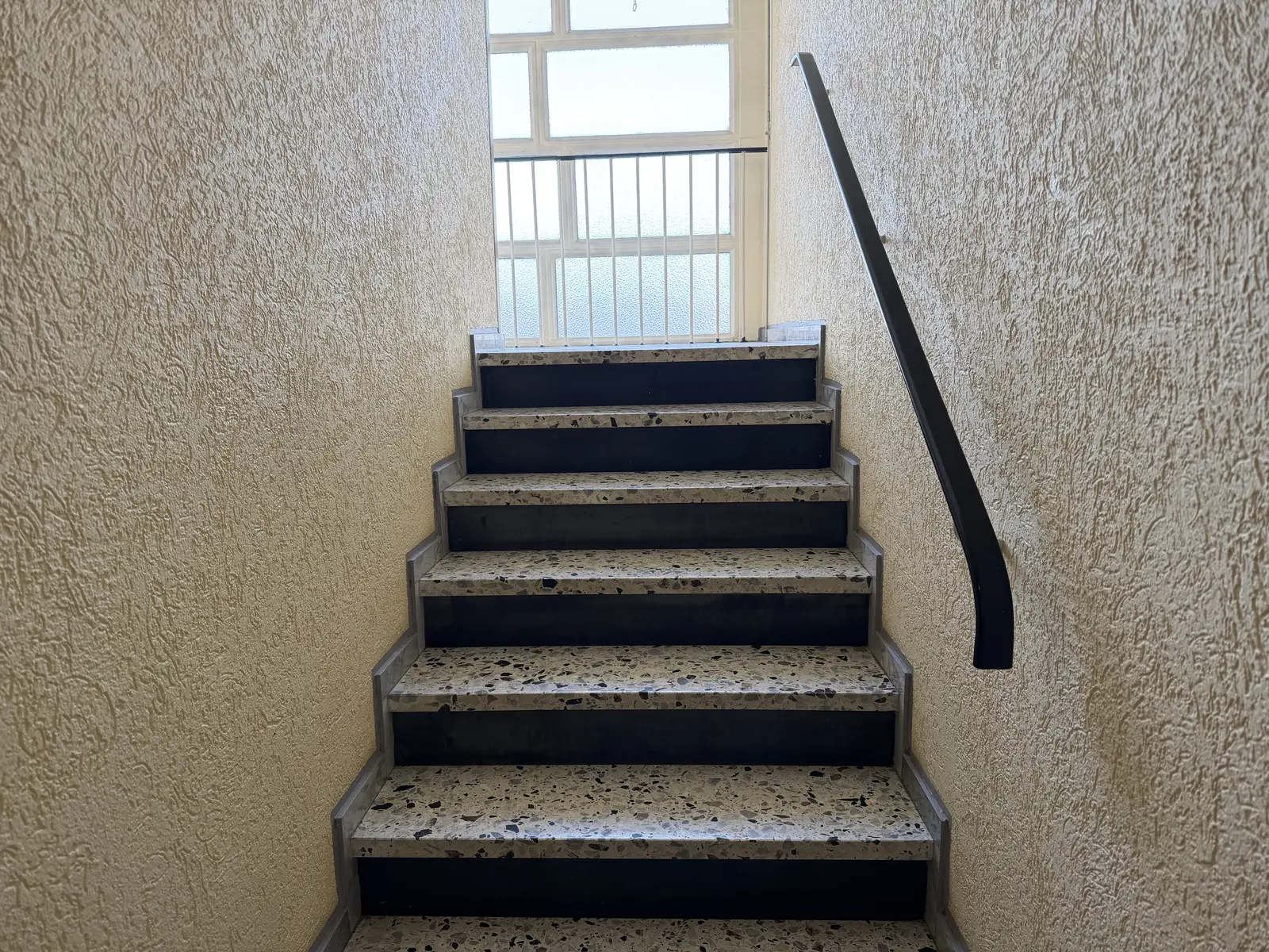 Treppenhaus mit Terrazzoboden